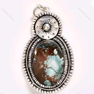 Tibetan turquoise and sterling silver pendant